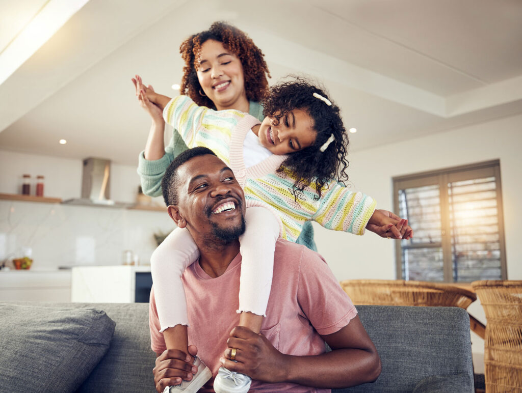 Happy family with home insurance
