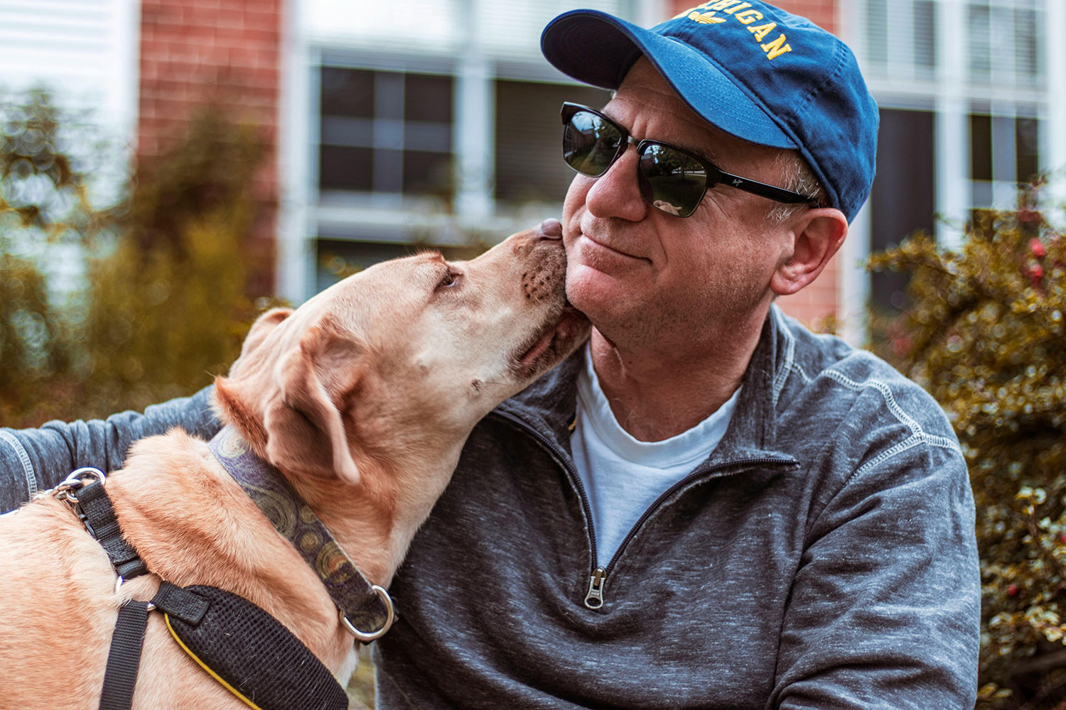 Photo of man with pet dog