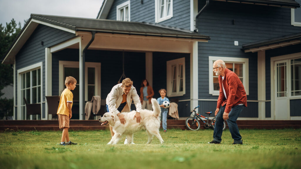 photo of a family playing in the yard