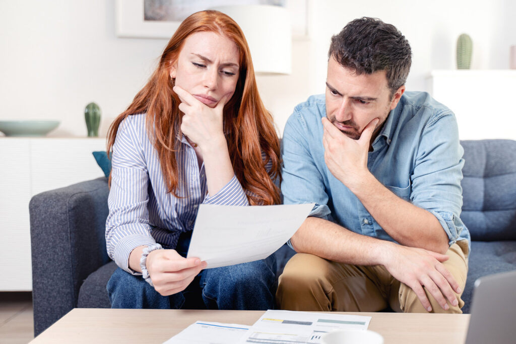 photo of couple trying to get out of debt