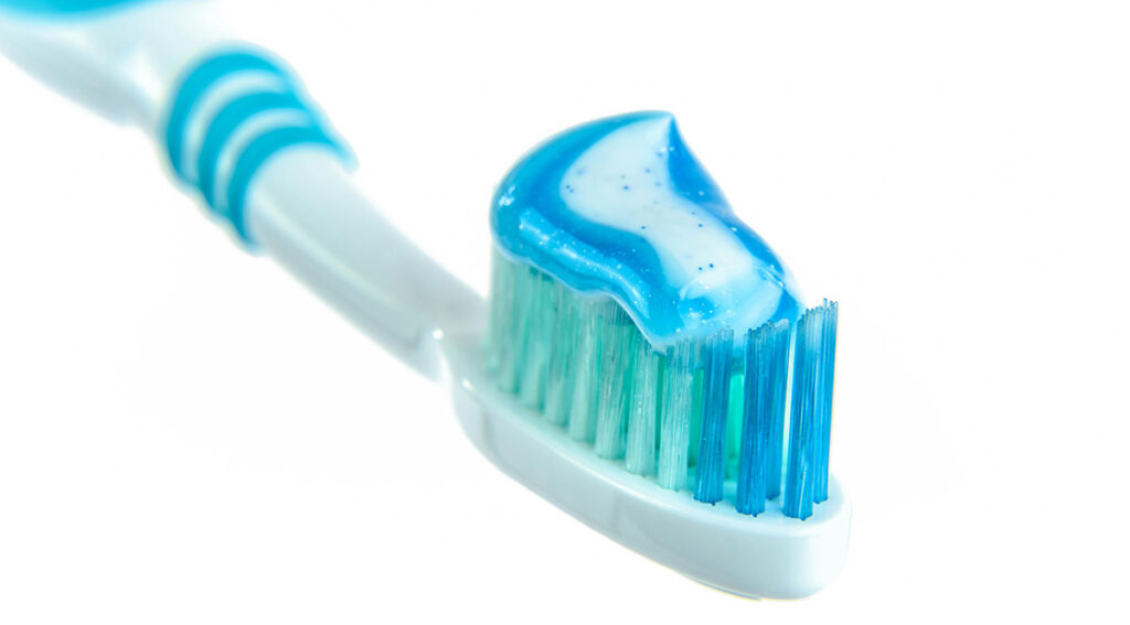 image of a toothbrush with toothpaste