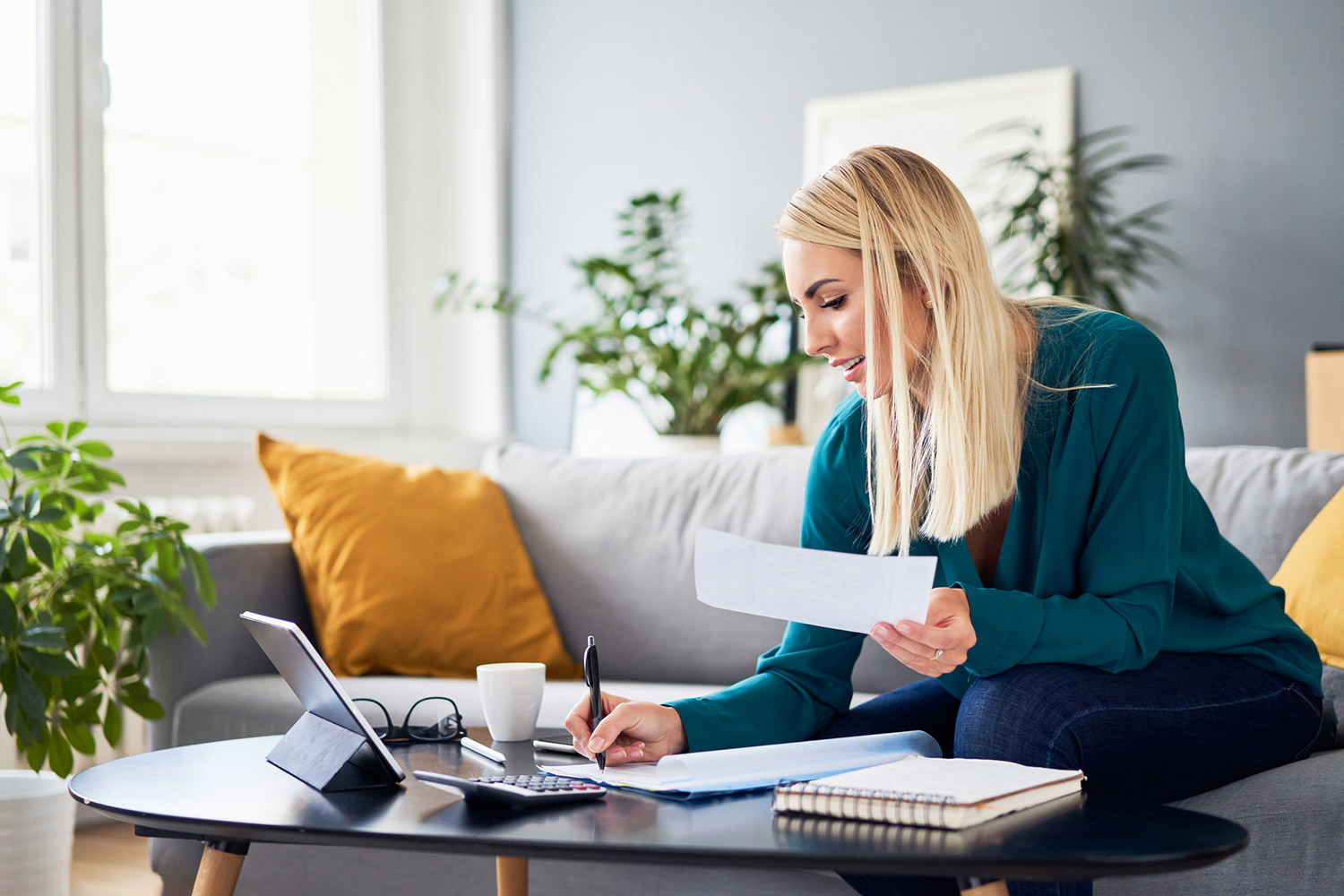 photo of a woman using the sub-savings account budgeting method